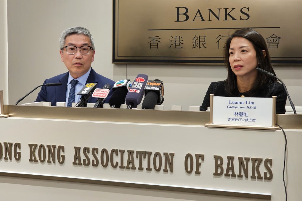 Arthur Yuen Kwok-hang, deputy CEO of the Hong Kong Monetary Authority (left) and Luanne Lim, chairwoman of the Hong Kong Association of Banks, speak in a media briefing on December 9, 2024 at the HKAB’s office in Gloucester Tower, Central. Photo: Enoch Yiu