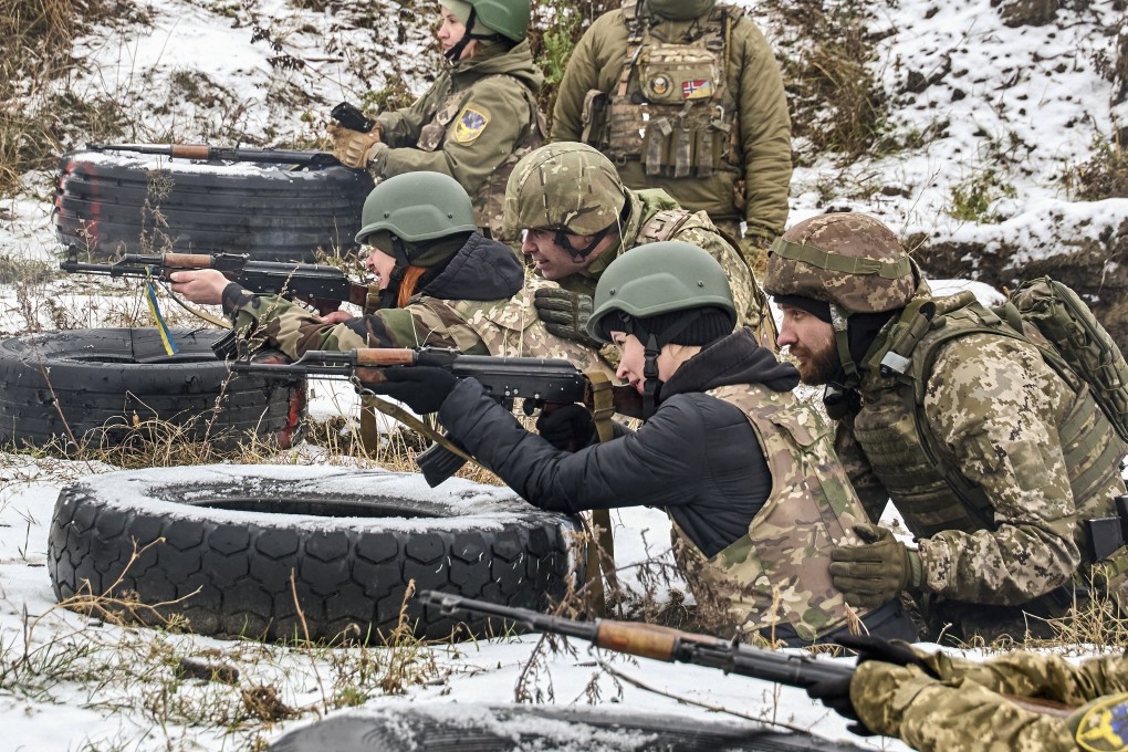 Ukrainian civilians take part in military training on a shooting range in the Kharkiv region, Ukraine, on Saturday. Photo: EPA-EFE