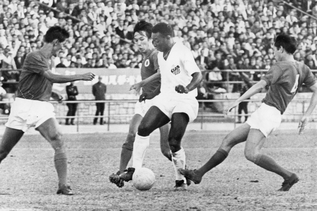Pele (in white), of the Brazilian football team Santos, in action against the Hong Kong League XI at the Hong Kong Stadium,in 1970. Photo: SCMP Archives