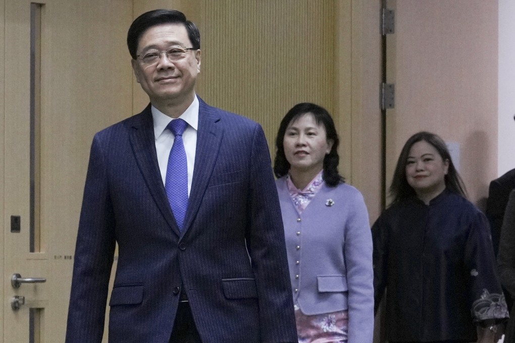 Chief Executive John Lee Ka-chiu is followed by Mable Chan, who was appointed secretary for transport and logistics, and Rosanna Law Shuk-pui, who was appointed secretary for culture, sports and tourism, at a press conference at the chief executive’s office in Tamar on December 5. Photo: May Tse