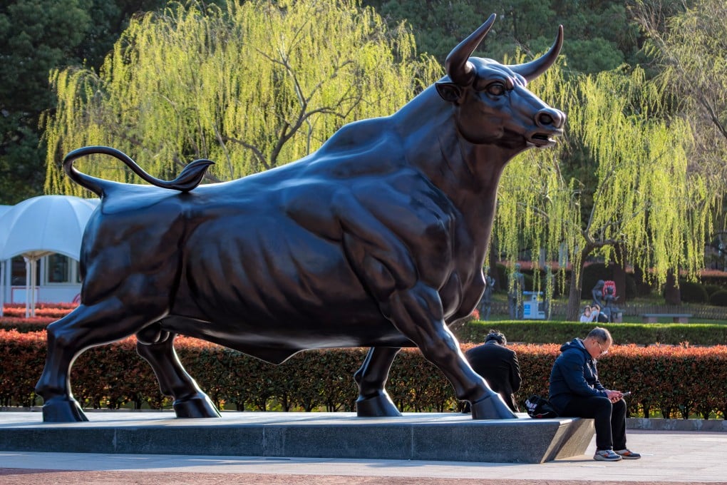 A statue of a bull stands in the Lujiazui financial district of Shanghai on March 16, 2023. Photo: EPA-EFE