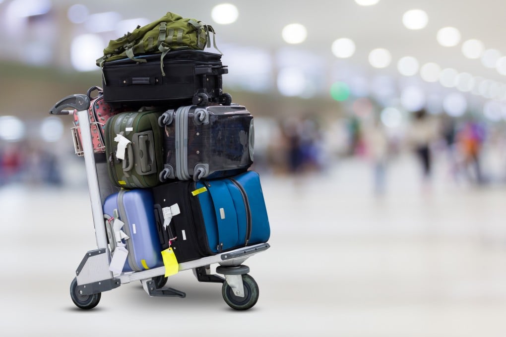 Airport luggage Trolley with suitcases: Photo: Shutterstock