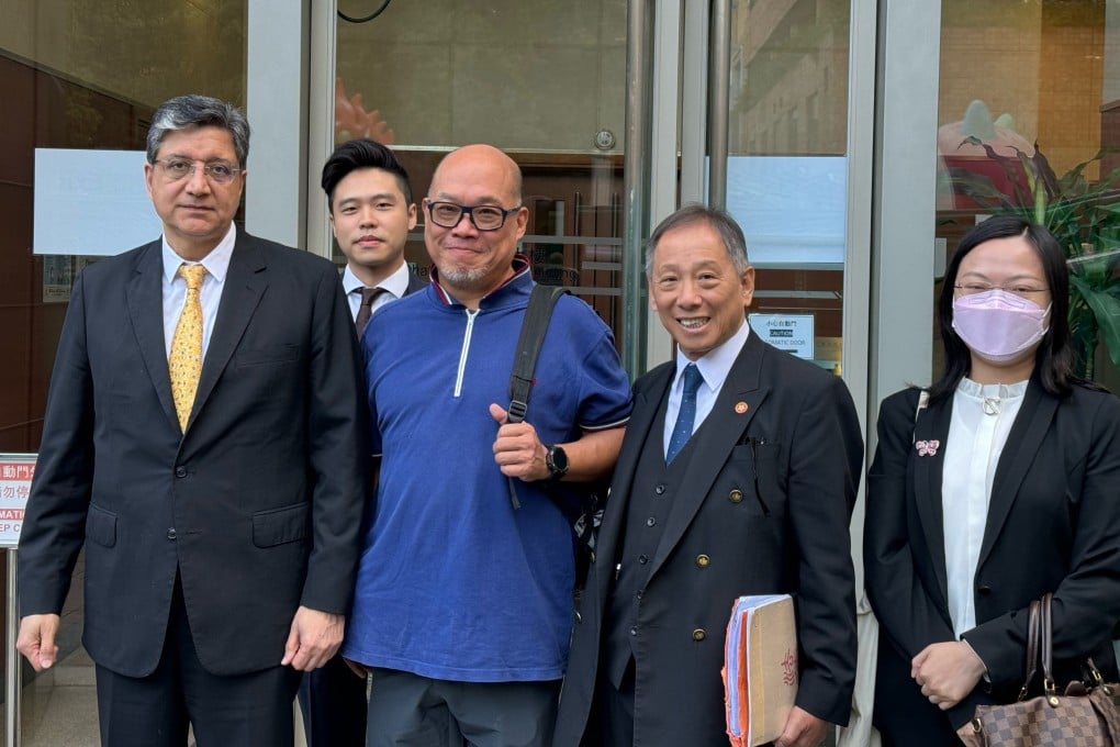 Kelvin Ip (centre) with his lawyer David Khosa (left) on Tuesday after the trial. Photo: Lo Hoi-ying