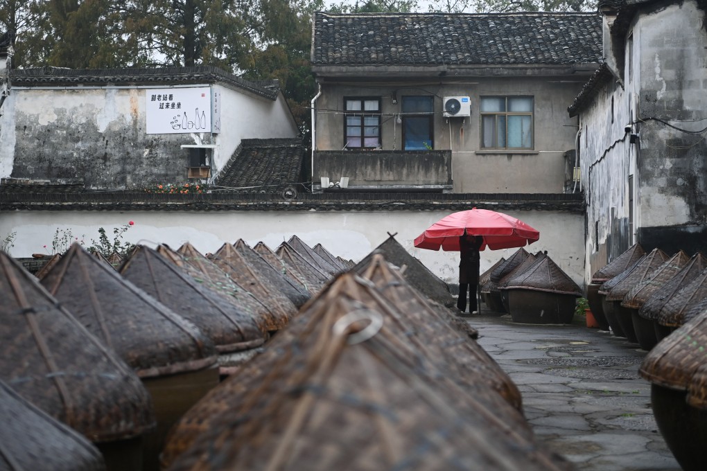 A villager works in a soybean paste workshop at the Youbu ancient town of Lanxi city in east China’s Zhejiang province. Photo: Xinhua