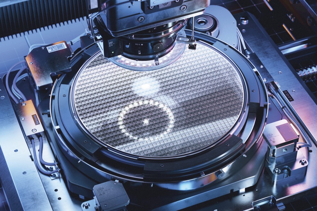 A silicon wafer during the photolithography process inside a computer chip production machine. Semiconductor manufacturing has been targeted by both the US and China with trade restrictions. Photo: Shutterstock