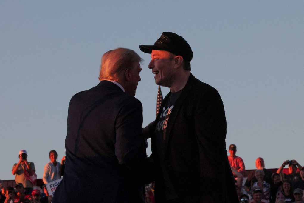 Tesla CEO and X owner Elon Musk (right) stands with Donald Trump during a campaign rally for Trump in Butler, Pennsylvania, US, on October 5. Photo: Reuters