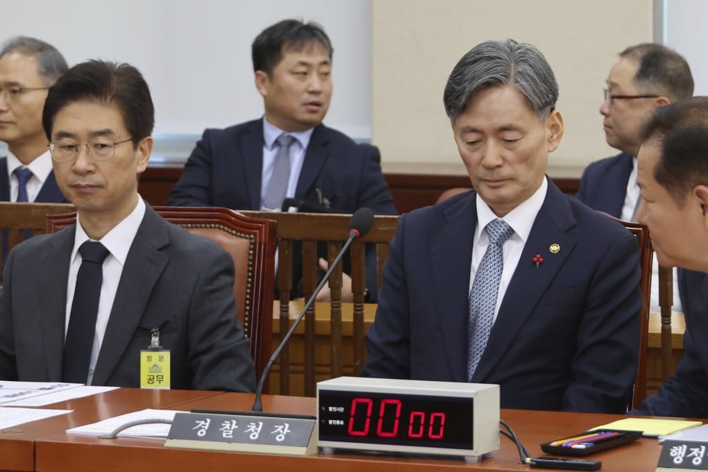 South Korean Interior and Safety Minister Lee Sang-min, (right) talks with National Police Agency Commissioner General Cho Ji-ho and Kim Bong-sik (left) head of the metropolitan police agency of Seoul, at the National Assembly in Seoul last week. Photo: Yonhap via AP