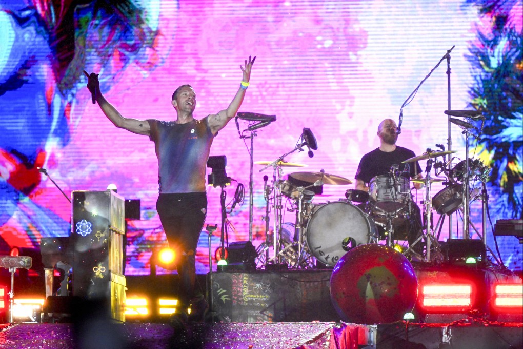 Singer Chris Martin (left) and drummer Will Champion of Coldplay perform in Rio de Janeiro, Brazil, in 2022. The British band will be at Kowloon’s Kai Tak Sports Park in April. Photo: AFP