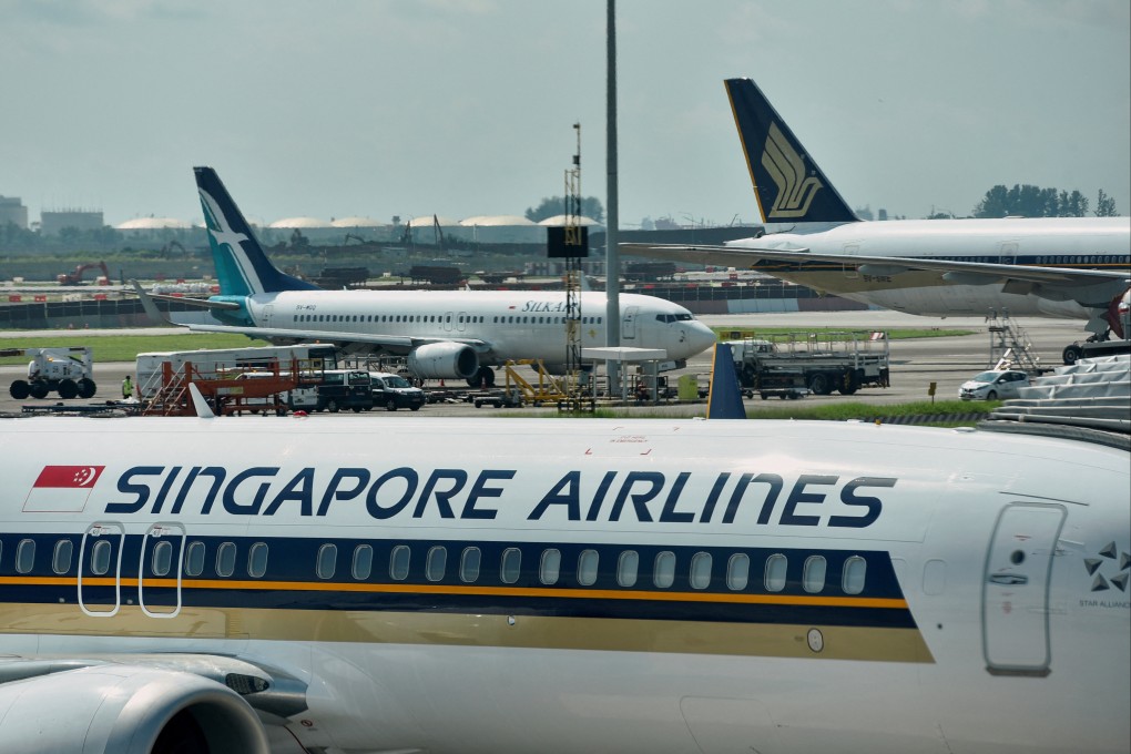 Singapore Airlines planes sit on the tarmac at Changi Airport in Singapore. Photo: Reuters