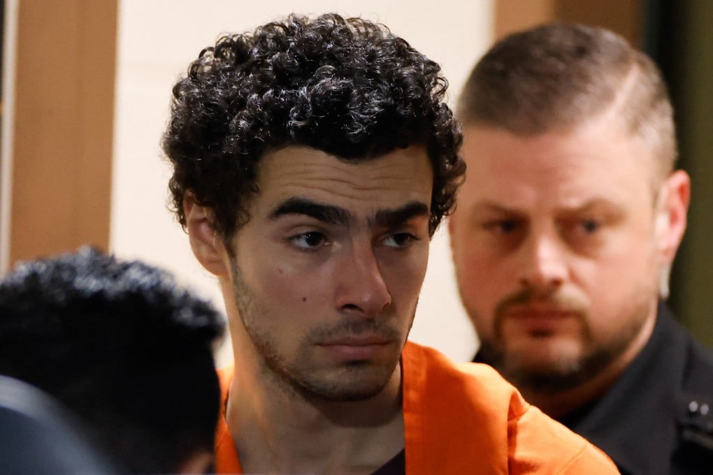 Luigi Mangione, a suspect in the New York killing of UnitedHealthcare CEO Brian Thompson, is escorted after an extradition hearing at Blair County Court House in Hollidaysburg, Pennsylvania, on Tuesday. Photo: Reuters