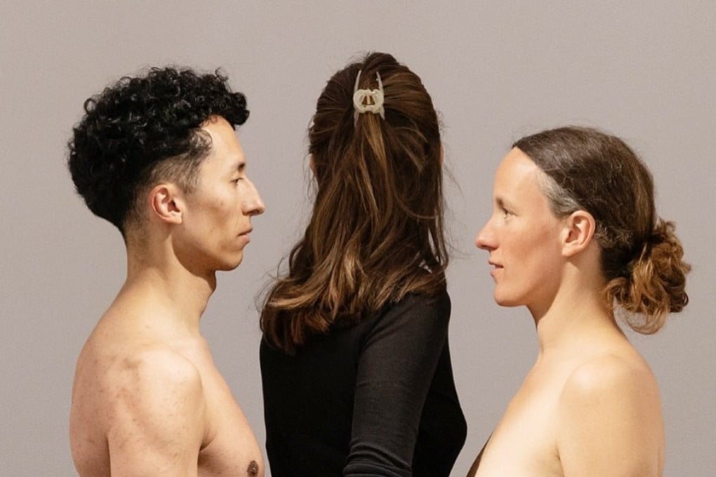 Visitors to the Marina Abramovic retrospective at the art museum in Switzerland enter the exhibition by passing between a man and a woman who are both naked. Photo: Instagram/abramovicinstitute