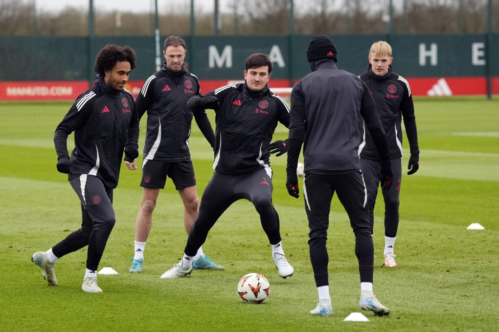 Manchester United’s Joshua Zirkzee (left) and Harry Maguire in action during a session at Carrington Training Centre. Photo: DPA