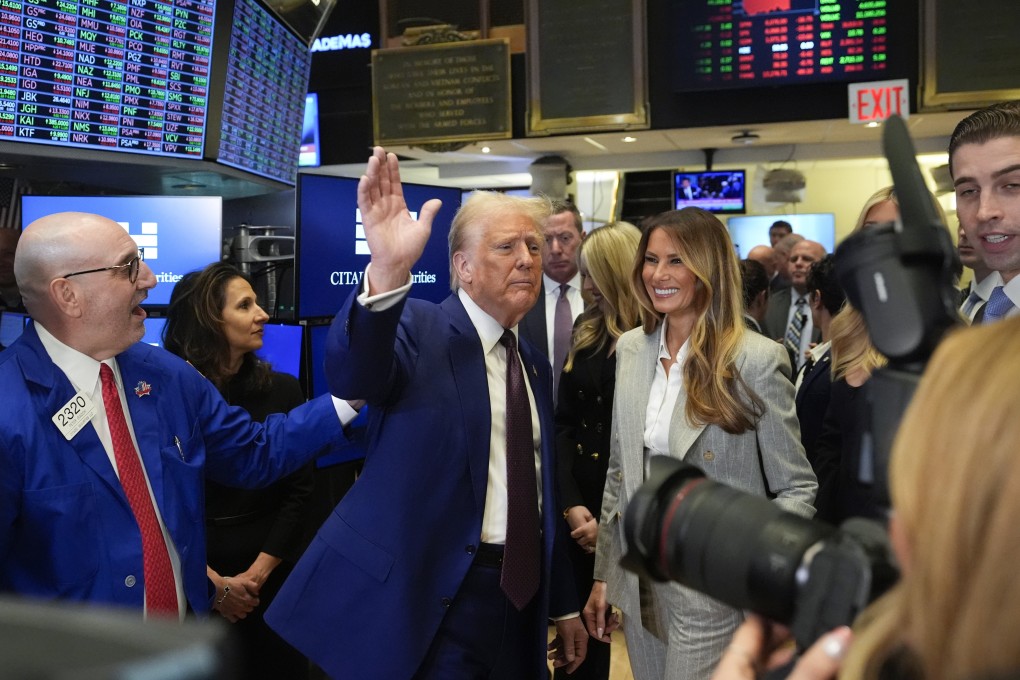 President-elect Donald Trump walks the floor of the New York Stock Exchange. Photo: AP