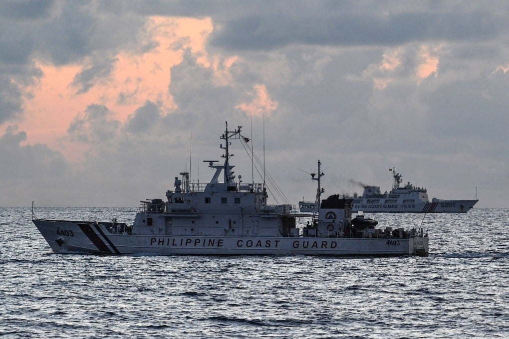 A Chinese coastguard ship shadows a Philippine vessel on patrol in the South China Sea. Photo: AFP