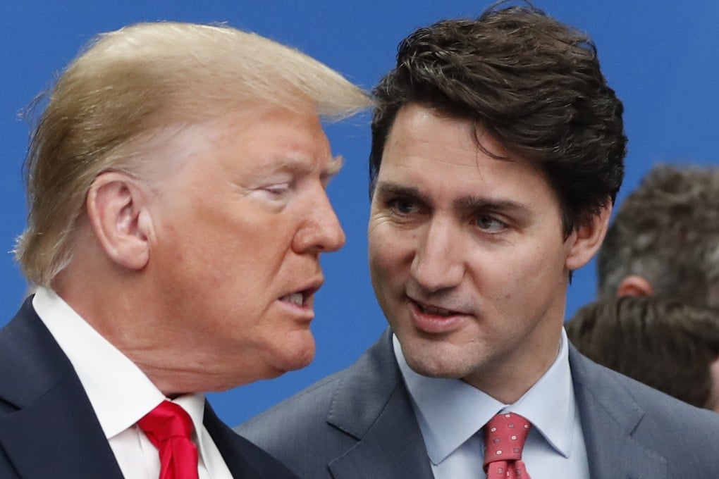 then-US President Donald Trump (left) and Canadian Prime Minister Justin Trudeau talk prior to a NATO round table meeting at The Grove hotel and resort in England, December 4, 2019. Photo: AP
