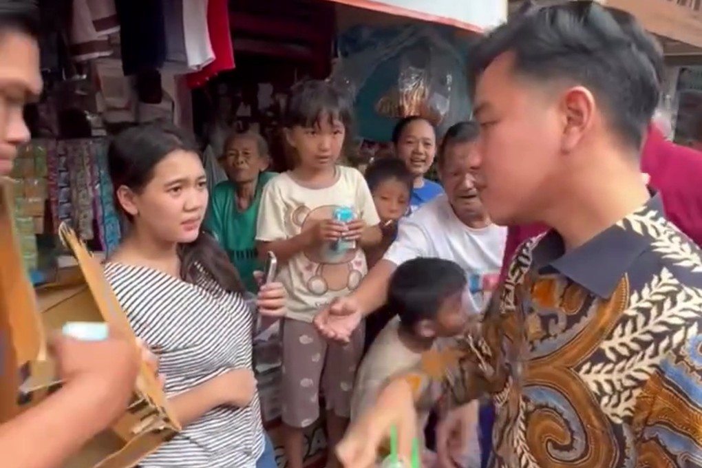 Indonesia’s Vice-President Gibran Rakabuming Raka distributes aid to flood victims in this still from a social media video. Photo: Instagram/Gibran_Rakabuming