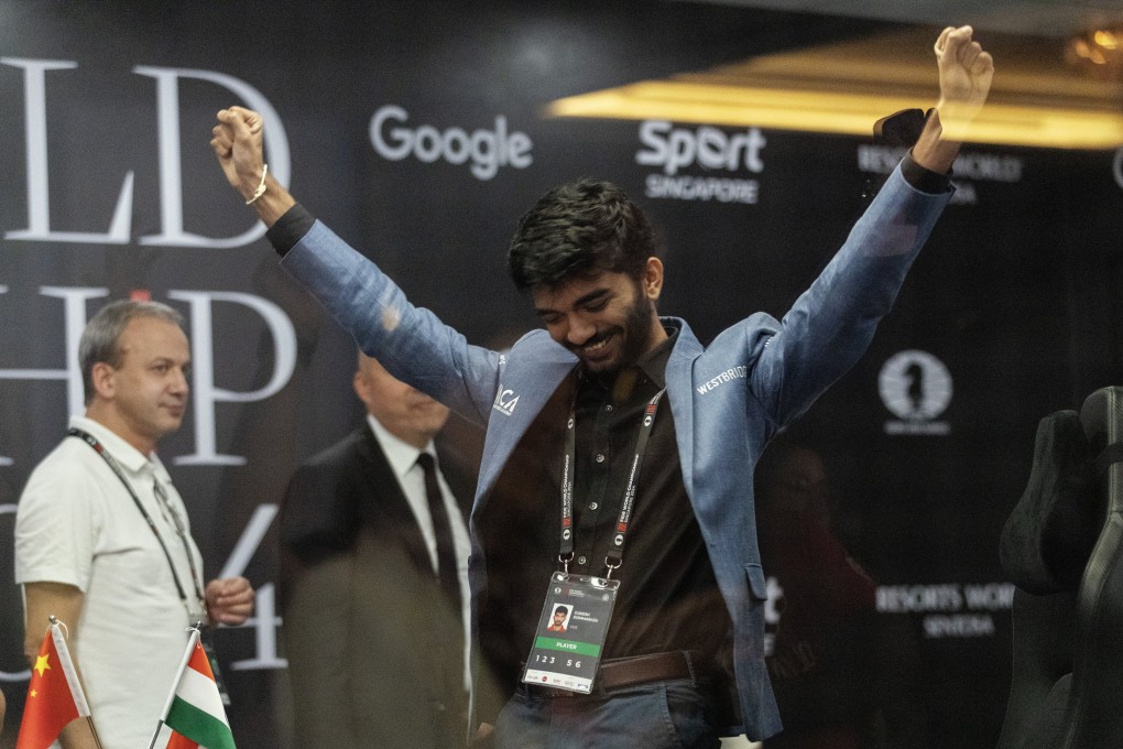 Chess grandmaster Gukesh Dommaraju of India celebrates after winning game 14 against China’s Ding Liren at the FIDE World Chess Championship in Singapore on Thursday. Photo: EPA-EFE