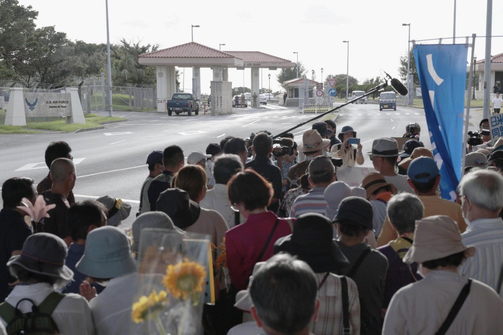 Residents stage a protest rally at Kadena Air Base in Japan’s Okinawa in June. Photo: Kyodo