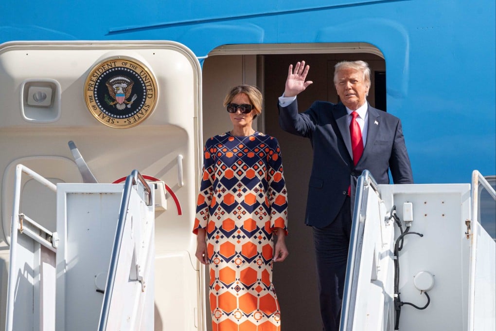 Donald and Melania Trump exit Air Force One at the Palm Beach International Airport in 2020. Photo: AFP
