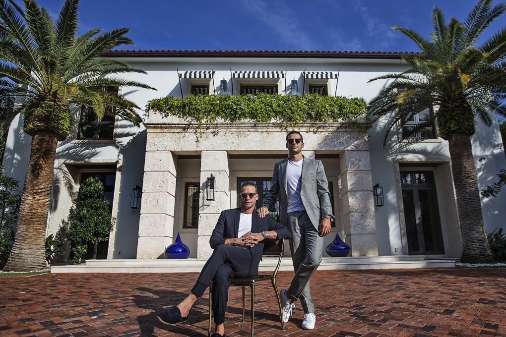 Real Estate Brokers Tal Alexander, left, and Oren Alexander at their home on Miami Beach in 2019. File photo: TNS