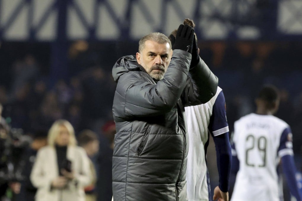 Tottenham boss Ange Postecoglou acknowledges the fans after the ex-Celtic manager’s side draw 1-1 against Rangers at Ibrox in the Uefa Europa League. Photo: AP