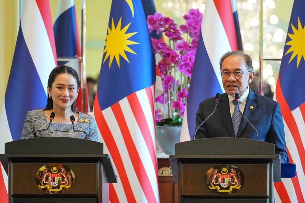 Malaysia’s Prime Minister Anwar Ibrahim and Thailand’s Prime Minister Paetongtarn Shinawatra speak in a joint press conference in Putrajaya on Monday. Photo: AFP