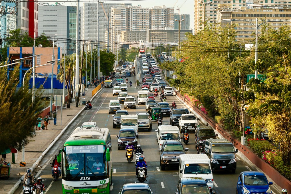 Vehicles travel a road in Metro Manila on February 28. China’s embassy in the Philippines has warned citizens to travel in groups, avoid high-risk areas and remain vigilant in crowds amid a crime surge. Photo: EPA-EFE