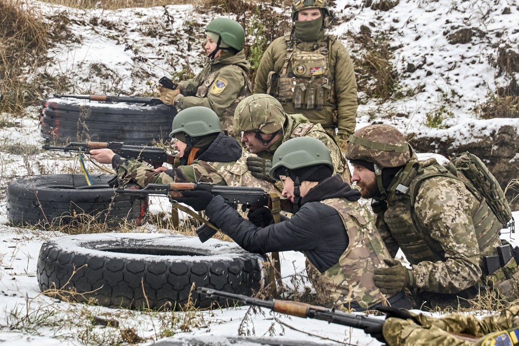 Ukrainian civilians take part in a military training session on a shooting range in Ukraine’s Kharkiv region, on December 7. Photo: EPA-EFE