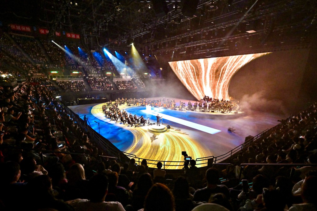 Chinese conductor and composer Tan Dun leads a performance at the Hong Kong Coliseum in October. Photo: Handout
