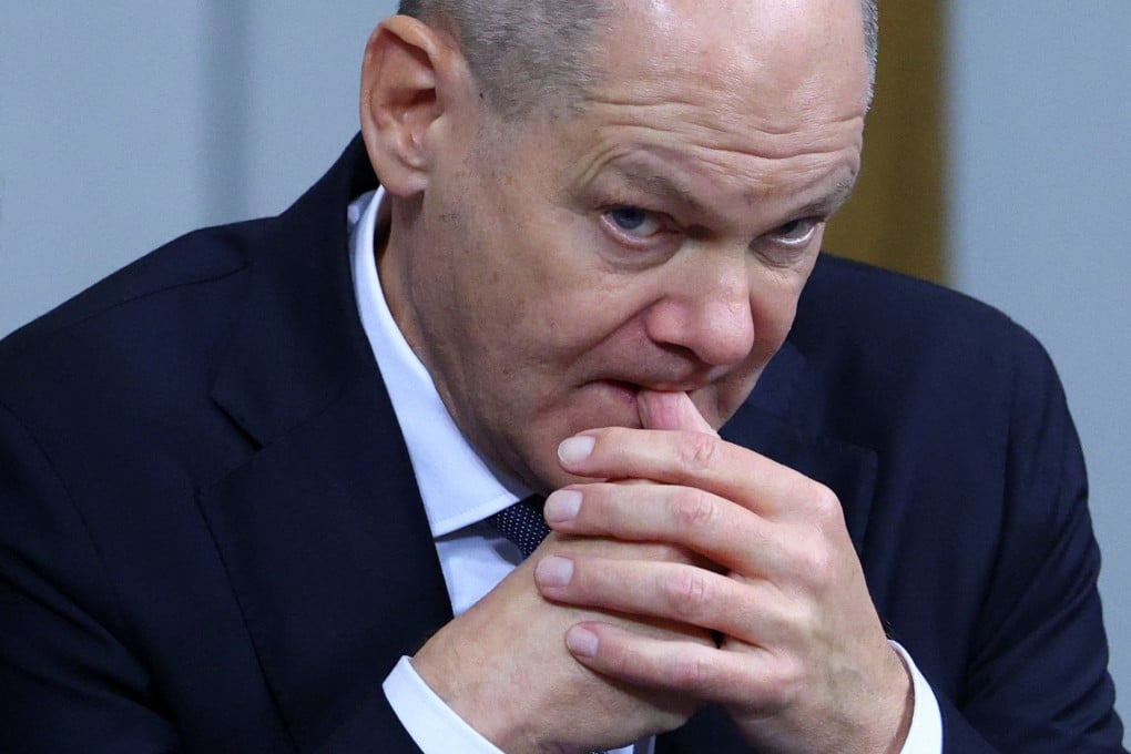 German Chancellor Olaf Scholz bites his finger, on the day of a confidence vote called by him to pave way for snap election. Photo: Reuters