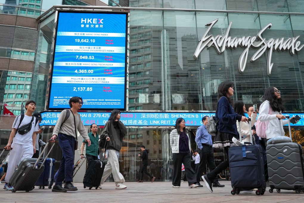 People pass Exchange Square in Central, home to Hong Kong Exchanges and Clearing, on November 21, 2024. Photo: May Tse