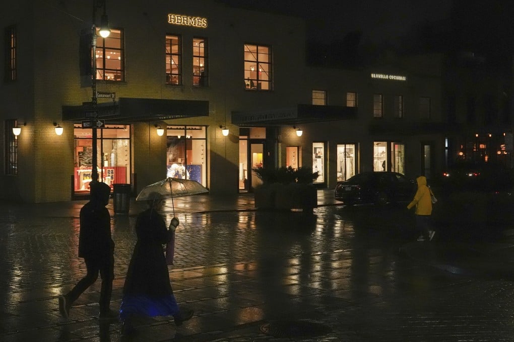 People passed a Hermes store in New York. Photo: AP