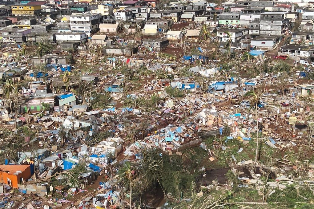 Destroyed housing in Combani, Mayotte after the cyclone hit. Photo: Securite Civile via AFP