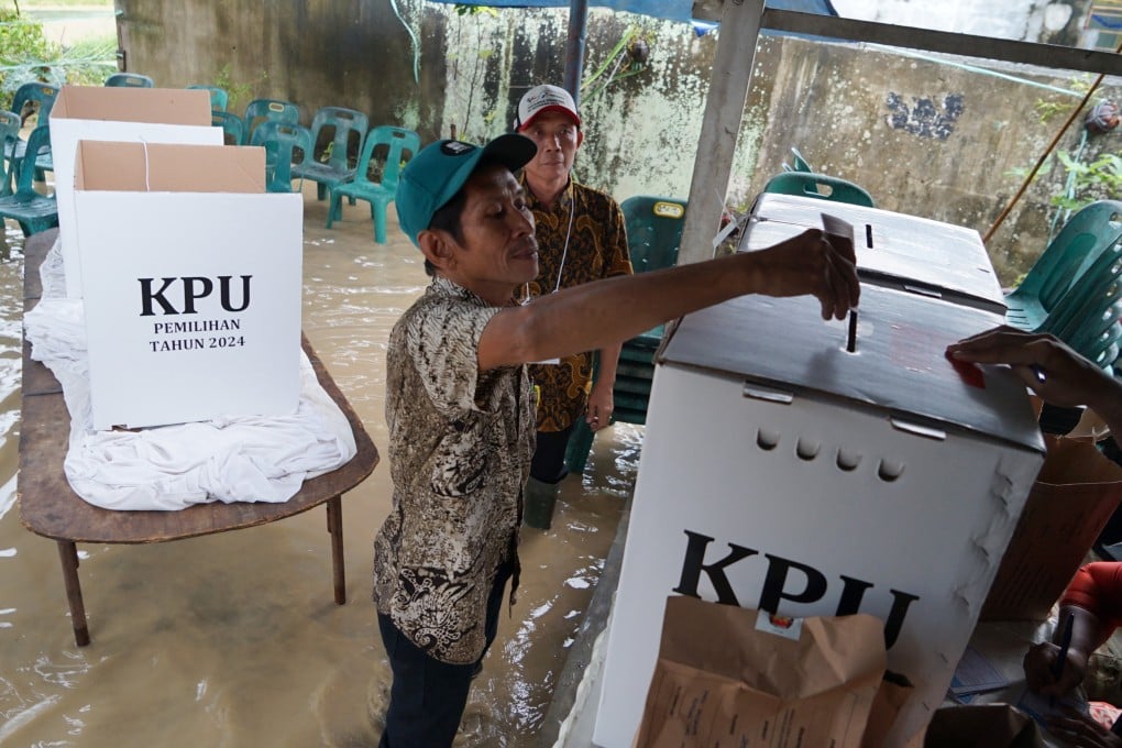 A man votes at a polling station in Tanjung Gusta, North Sumatra province, last month during Indonesia’s regional elections. Photo: Xinhua