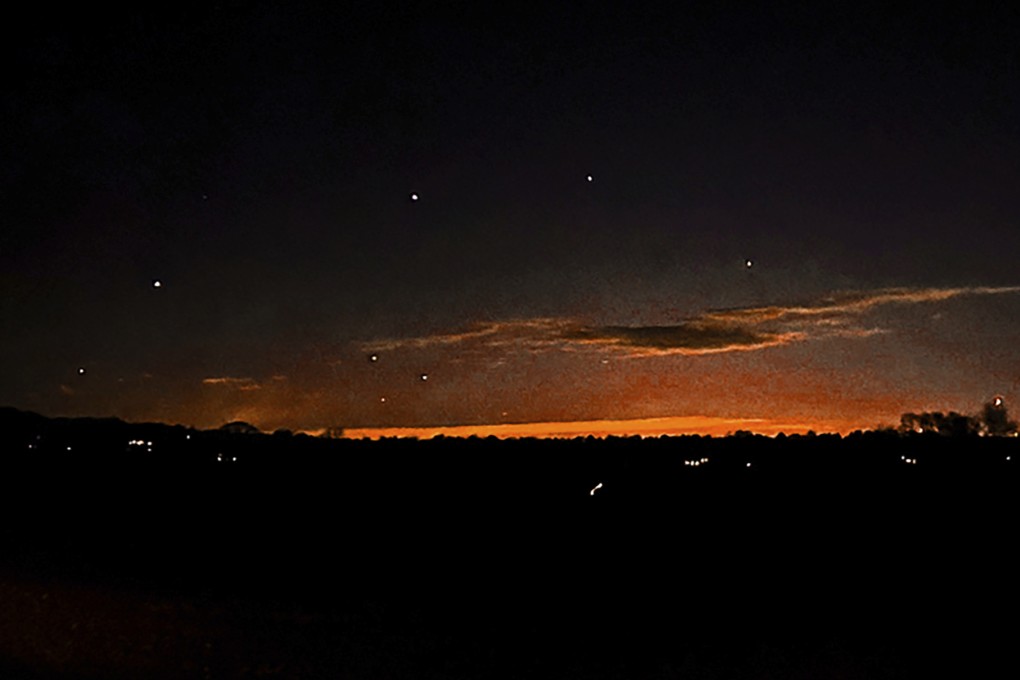 This photo provided by Trisha Bushey shows points of light seen near Lebanon Township, New Jersey, on Thursday, December 5. Photo: AP