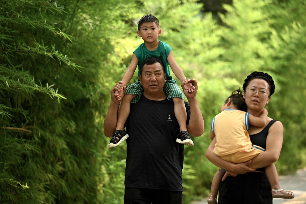 A professor at Renmin University has asked a visiting Kazakh politician how China could “obediently, submissively have children, have children early and have lots of children”. Photo: AFP