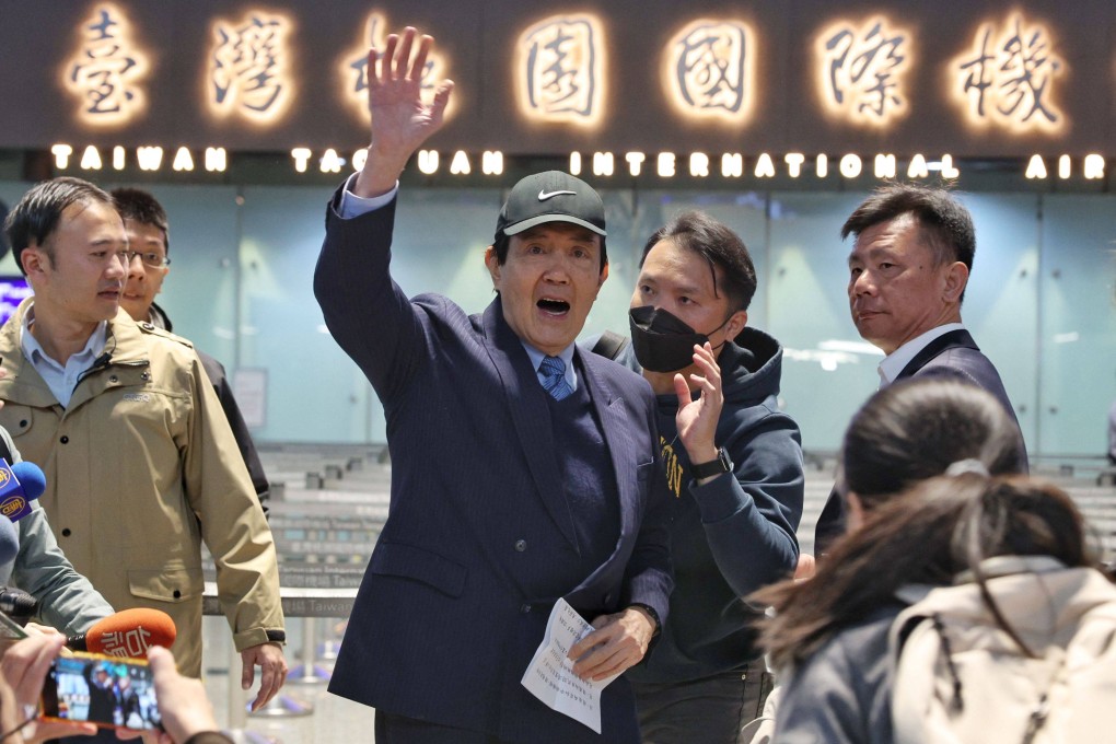 Former Taiwanese leader Ma Ying-jeou waves to the media at Taoyuan International Airport before travelling to Harbin on Wednesday. Photo: AFP
