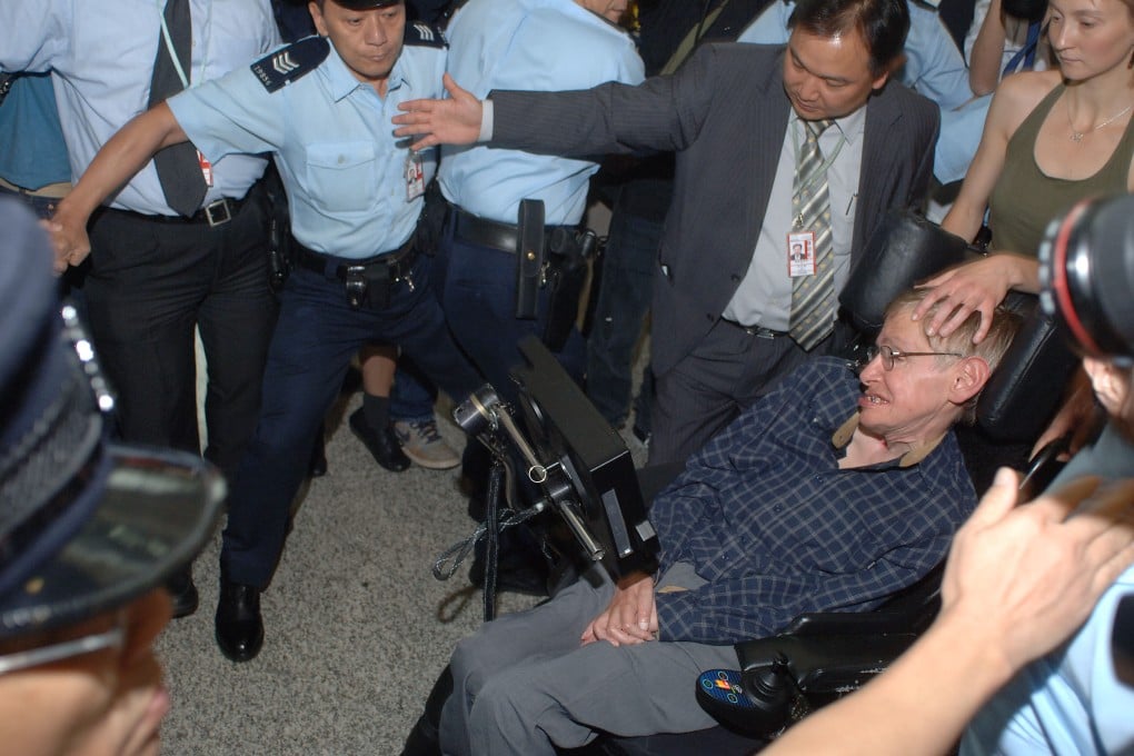 When Stephen Hawking visited Hong Kong to give a lecture in 2006, he was mobbed at Hong Kong International Airport like a rock star. Photo: SCMP