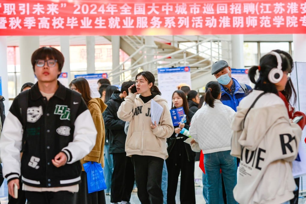 College students attend a job fair in Huai’an, a city in eastern China. More than 12 million graduates entered China’s job market this summer, pushing the nation’s youth unemployment rate up to over 18 per cent. Photo: CFOTO