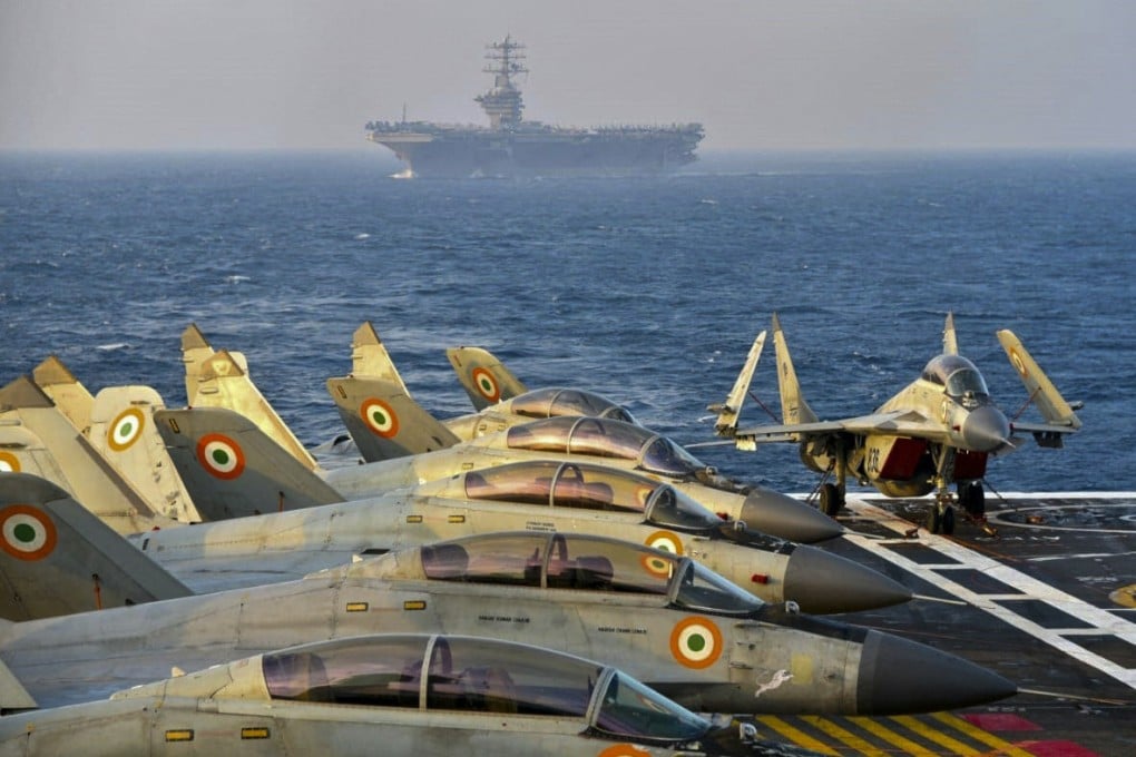 Indian army fighter jets on the deck of an aircraft carrier during the second phase of the Malabar naval exercise in the Arabian Sea. Photo: Indian Navy/AFP
