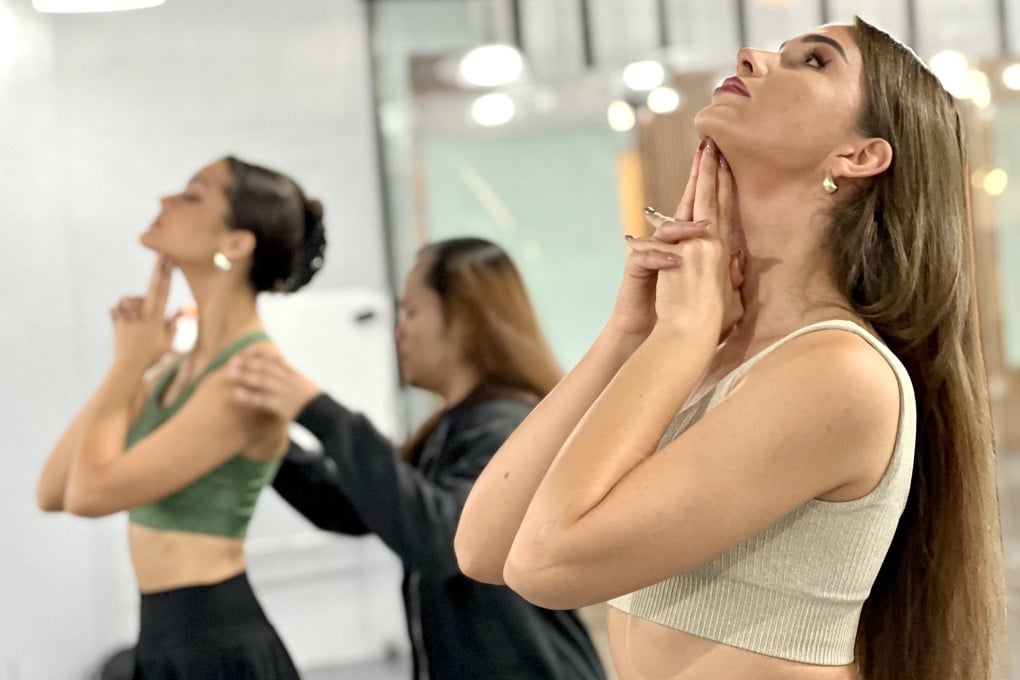 The reigning Miss Germany, Celina Weil, practises a pose at the Kagandahang Flores beauty pageant school in Manila. Photo: dpa/picture alliance via Getty Images