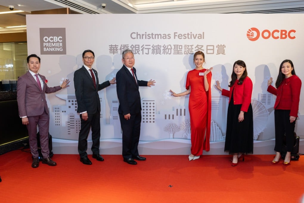 Kelly Cheung (third right) at the event’s opening ceremony with (from left) Wallace Lam, Stephen Leung, Wang Ke, Josephine Lee and Michelle Chiu of OCBC Hong Kong.