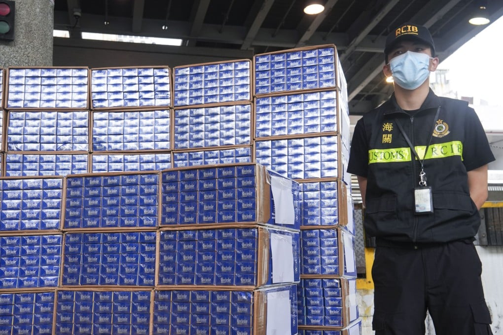 Seized black market cigarettes are displayed by customs. In the first 11 months of this year, 18,780 people were arrested for smuggling, storing, distributing or peddling illicit cigarettes, a 71 per cent increase over the 10,995 arrests made during all of 2023. Photo: Sun Yeung