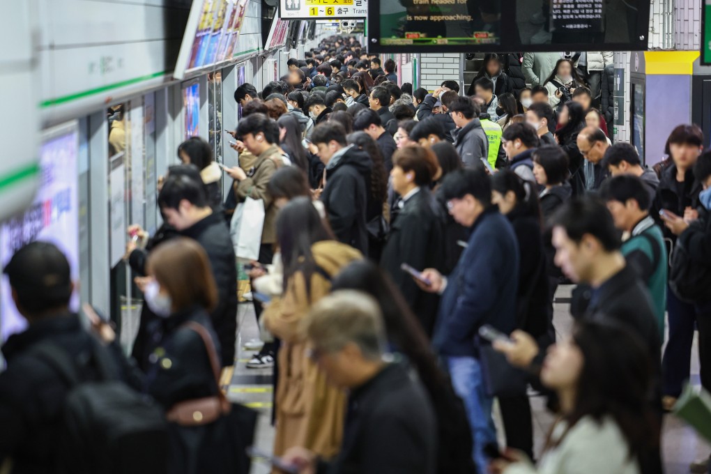 Commuters in South Korea, where more than 40 per cent of men and more than 65 per cent of women surveyed would be OK with not having children. The country has the world’s lowest fertility rate. Photo: Yonhap/dpa