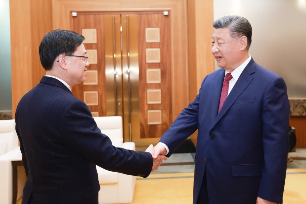 Hong Kong leader John Lee (left) and Chinese President Xi Jinping meet on Thursday. Photo: Xinhua
