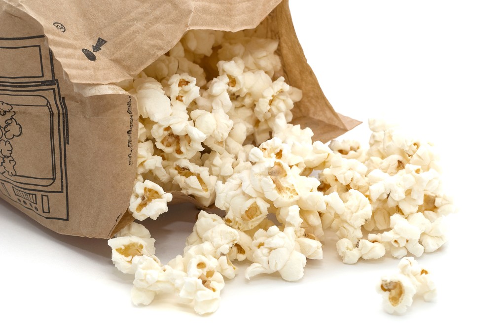 India’s GST Council says non-branded popcorn mixed with salt and spices will attract a 5 per cent GST, pre-packaged and branded popcorn 12 per cent, and caramel popcorn, categorised as a sugar confectionery, 18 per cent. Photo: Shutterstock