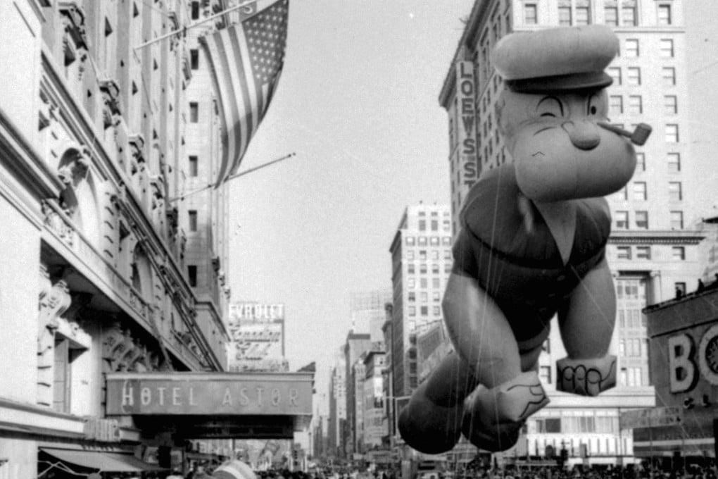 An inflatable Popeye at the Thanksgiving Day Parade in New York on November 26, 1959. Popeye enters the public domain in 2025. Photo: AP
