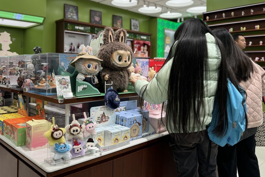 Customers select Labubu toys at a Pop Mart store in Shanghai on December 17. Photo: Mandy Zuo
