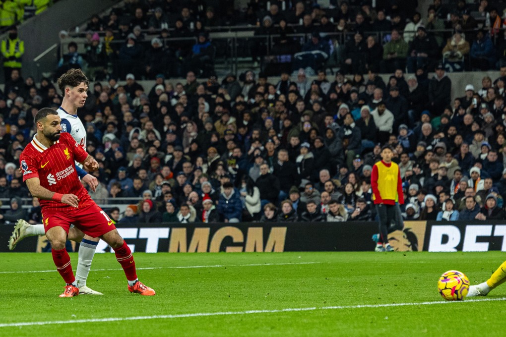 Liverpool’s Mohamed Salah (left), scoring his side’s fifth goal against Spurs, is the first player in EPL history to hit double figures in goals and assists before Christmas. Photo: Xinhua