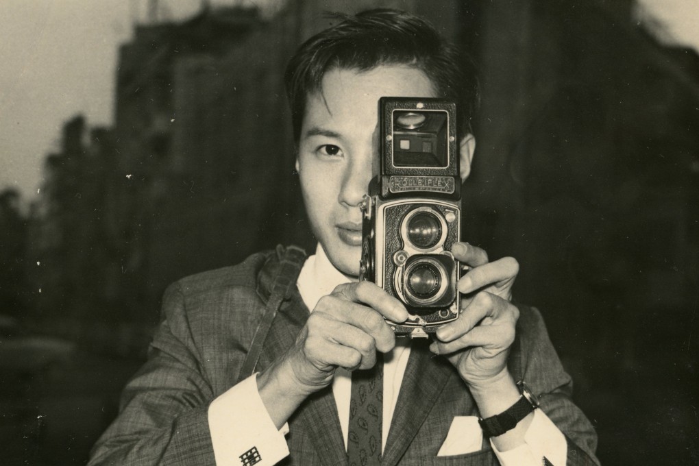 Fan Ho with his Rolleiflex 3.5 A (type K4A) camera which he used to take phots of Hong Kong in the 50s and 60s. Photo: Fan Ho